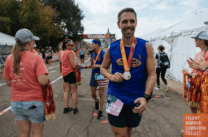 Andre Anderson finishes the Twin Cities Marathon in St. Paul on Sunday (Photo: Carly Danek/MPR News)